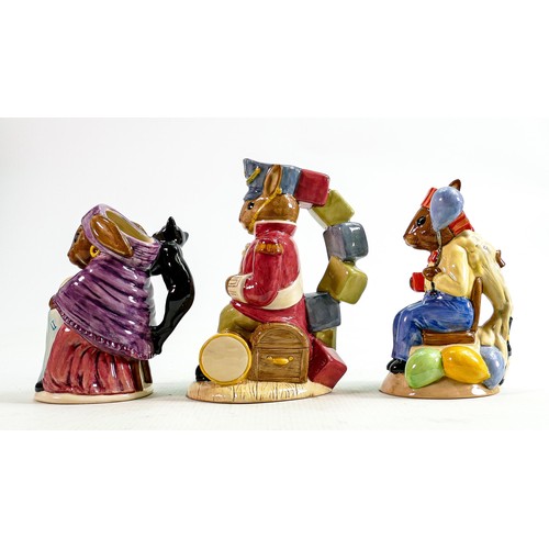 212 - Royal Doulton Bunnykins jugs to include:
Partytime D7160, Fortune Teller D7156 and Toy Soldier D7185... 