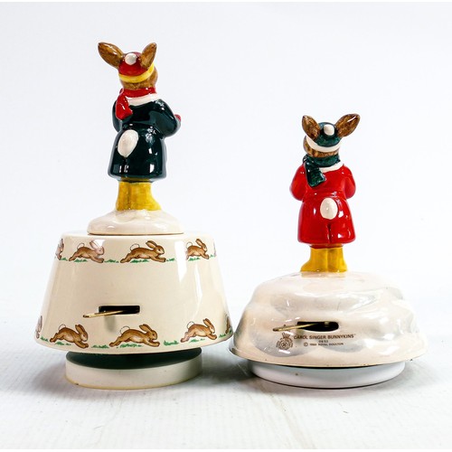 222 - Royal Doulton Bunnykins musical figures: Carol Singer together with Carol Singer DB53