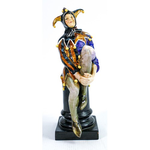 336 - Royal Doulton Jester HN1295: Impressed date 1928, in orange & blue colour way, height 24cm. Bobble m... 