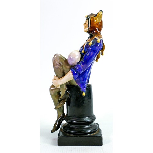 336 - Royal Doulton Jester HN1295: Impressed date 1928, in orange & blue colour way, height 24cm. Bobble m... 