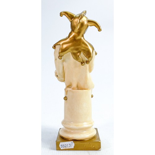 337 - Rare Royal Doulton Jester HN1295: In velum & gold, height 25cm - slight loss of gold to rear of base... 