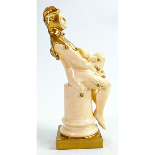 337 - Rare Royal Doulton Jester HN1295: In velum & gold, height 25cm - slight loss of gold to rear of base... 