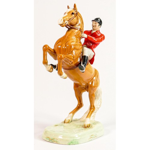 164 - Beswick rare Huntsman on rearing Palomino horse 868: h.24cm.