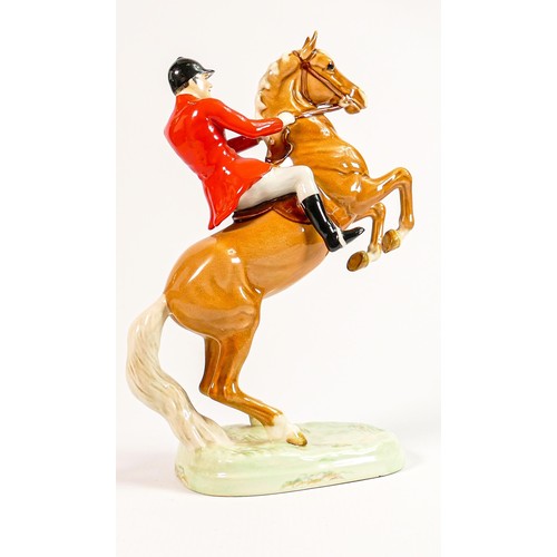 164 - Beswick rare Huntsman on rearing Palomino horse 868: h.24cm.