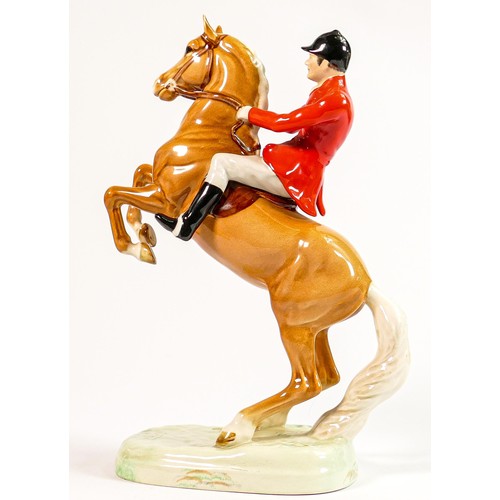 164 - Beswick rare Huntsman on rearing Palomino horse 868: h.24cm.