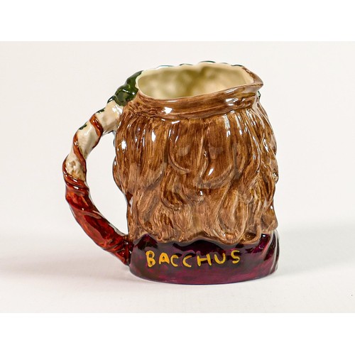 325 - Royal Doulton small character jug Bacchus D6505: Painted in a different colourway.