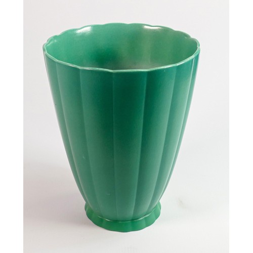 169 - Keith Murray for Wedgwood: A tall ribbed green vase, h.23cm.