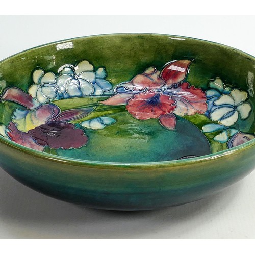 171 - Walter Moorcroft large dish decorated in the Orchid design: Diameter 27cm.