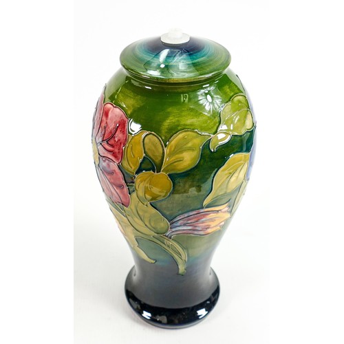 174 - Moorcorft Anemone on green ground large lamp base: Queen Mary sticker noted height 33cm