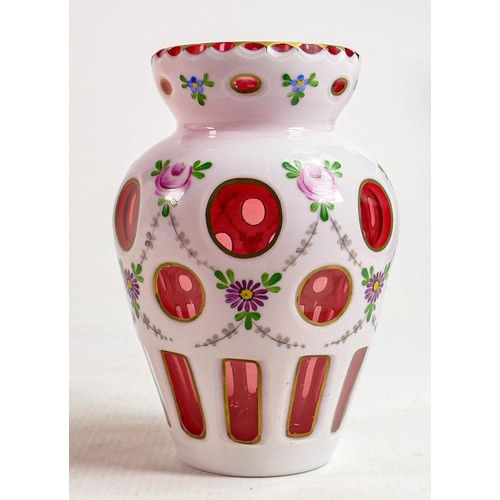 894 - Bohemian glass vase with overlay cut to Cranberry with hand decorated flowers & garlands: Height 15c... 