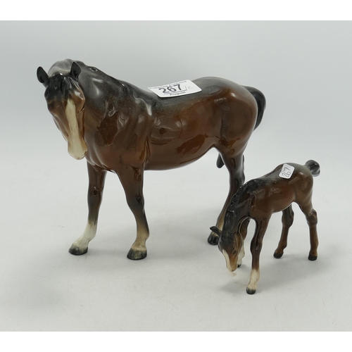 267 - Beswick brown foal grazing: 946 together with mare facing left (2)