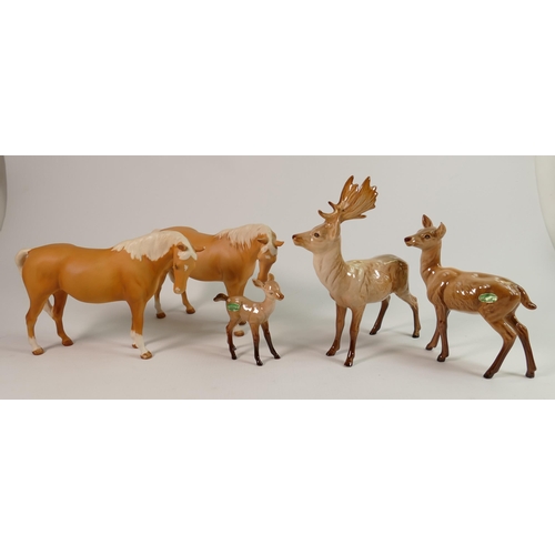 314 - Beswick Stag family group: stag standing, doe and fawn, together with Two Matt Beswick Palomino Mare... 