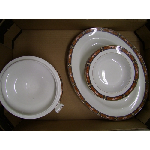 93 - Wedgwood Chippendale Patterned Dinner ware to include 2 large oval platters, lidded tureen & 6 rimme... 