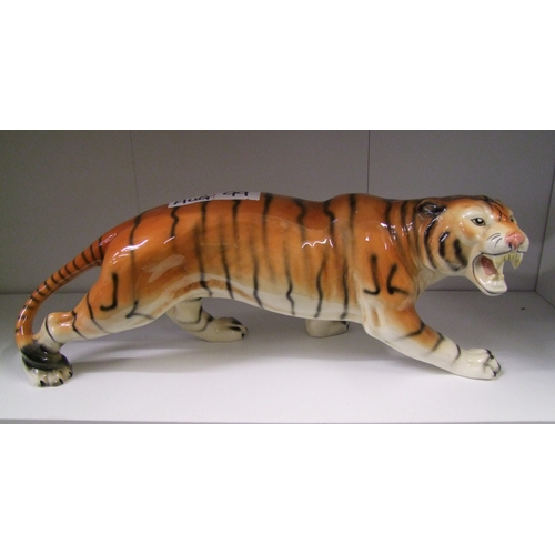 99 - Large Melba Ware stalking tiger figure.