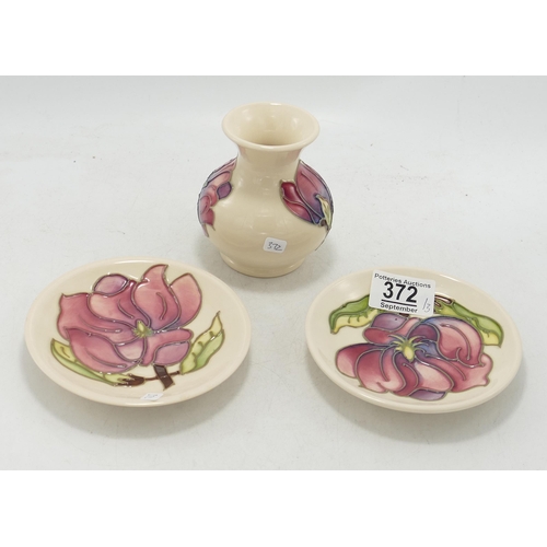 372 - Moorcroft Pink Magnolia on Cream Ground Coasters & small Vase, height of vase 9.5cm, silver lined se... 