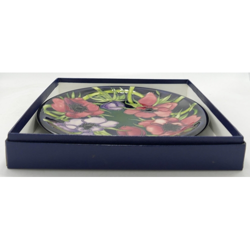 375 - Boxed Moorcroft Anemone Tribute Patterned Plate, diameter 26cm