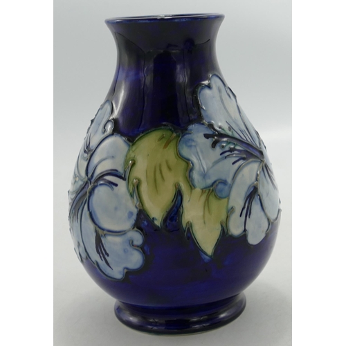 4 - Moorcroft Hibiscus on Blue Ground Vase, height 13.5cm