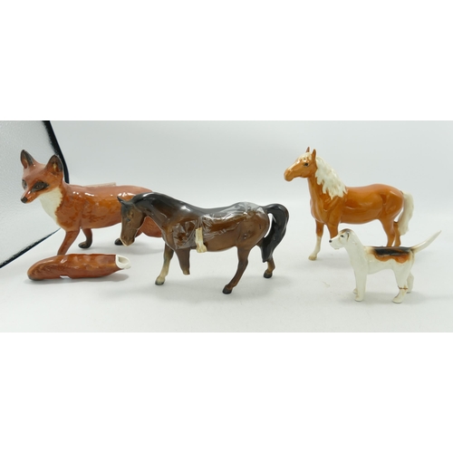 87 - Beswick Damaged items to include ponies, large fox & foxhound (4)