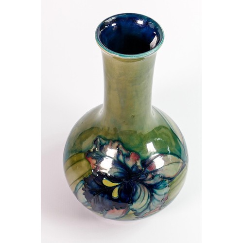 32 - William Moorcroft vase decorated in the Iris design: On green ground, c1930, full signature & impres... 