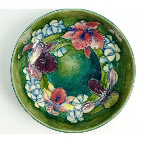 33 - Walter Moorcroft large dish decorated in the Orchid design: Diameter 27cm.
