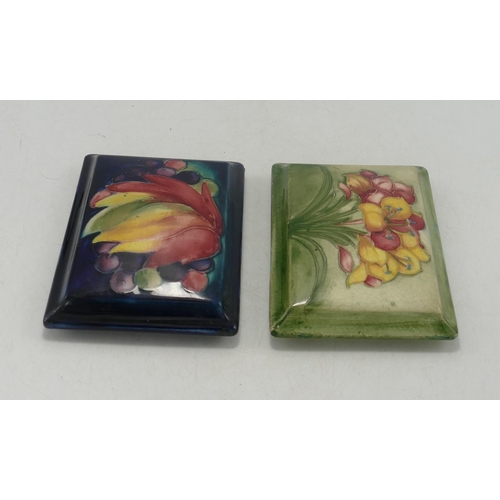 325 - Moorcroft Spring Flowers & Leaf & Berry pattern oblong pot lids, each 9 x 12.5cm (2)