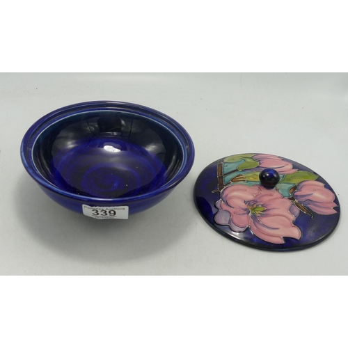 339 - Moorcroft Pink Magnolia on Blue Ground Powder Pot, diameter 16cm