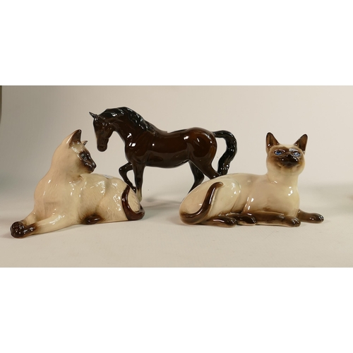 411 - Beswick Stocky Jogging Mare 855, together with 	
Beswick Siamese Cats 1558 & 1559. (3)