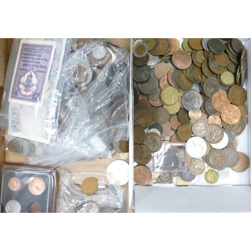 565 - A vast quantity of UK and world coins dating from the 18th century onwards, contained in 8 full size... 