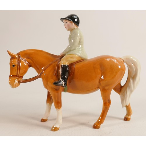 625 - Beswick boy on palomino pony 1500. (boys head re-stuck)