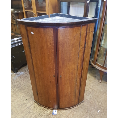 620 - Mahogany corner wall hanging cabinet.