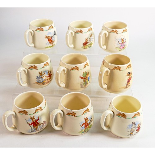 63 - Royal Doulton Bunnykins Don one handled mugs, 4 Barbara Vernon pieces noted. (9)