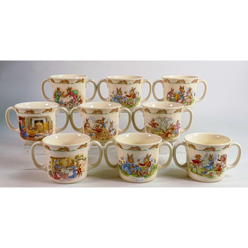 66 - Royal Doulton Bunnykins Hug a Mug two handled baby's mugs. (9)