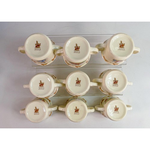 66 - Royal Doulton Bunnykins Hug a Mug two handled baby's mugs. (9)