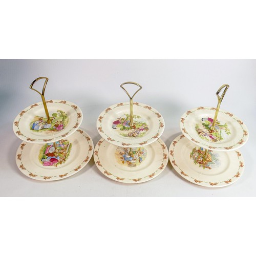 74 - Three Royal Doulton Bunnykins two tier cake stands. (3)