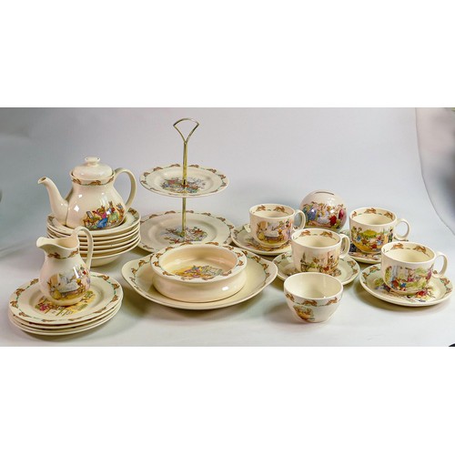 78 - Royal Doulton Bunnykins items to include - teapot, cups and saucers, plates, bowls, money box & a tw... 