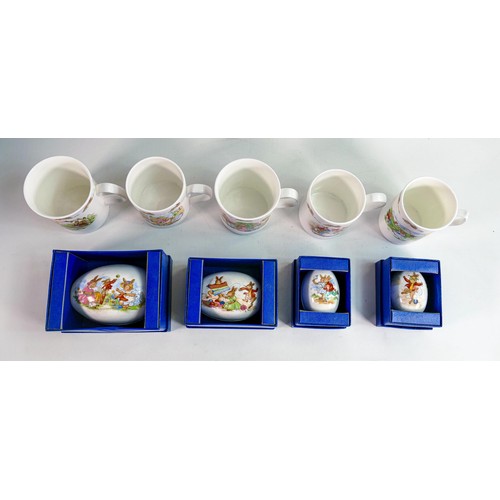 92 - Royal Doulton Bunnykins white china mugs x 5 & boxed decorative egg boxes x 4. (9)