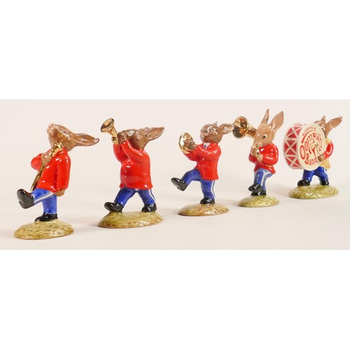 97 - A Royal Doulton rare Bunnykins Oompah band set of figures with gold highlights, comprising -Drummer ... 