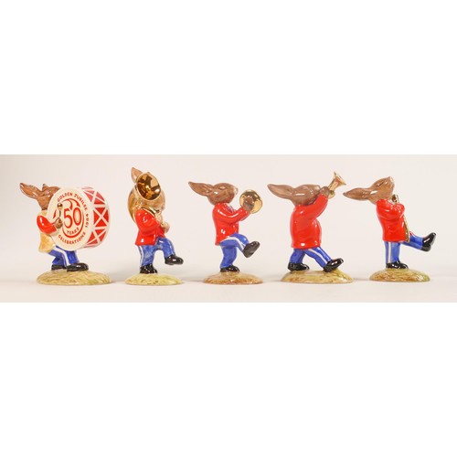 97 - A Royal Doulton rare Bunnykins Oompah band set of figures with gold highlights, comprising -Drummer ... 