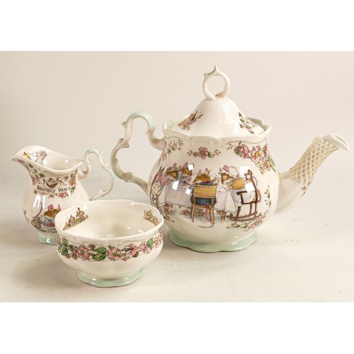 117 - Royal Doulton Brambly Hedge tea service including - teapot, cream & sugar (both boxed) together with... 