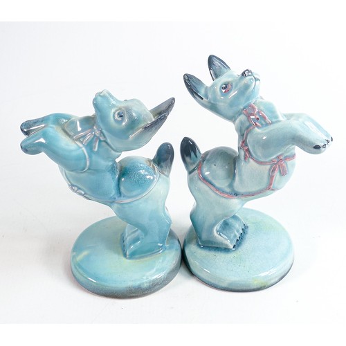 138 - Beswick blue gloss model of a character dog begging & similar with pink highlights. (2)