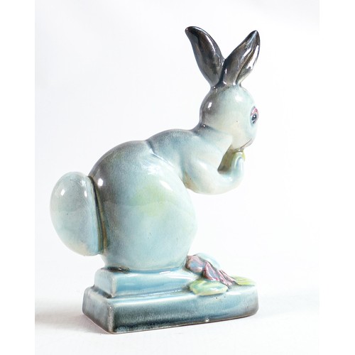 141 - Beswick blue gloss model of a rabbit on pottery base 316, coloured section to flower & eyes noted.