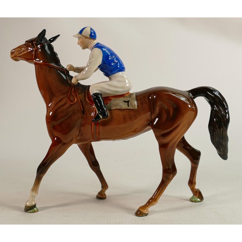 192 - Beswick Jockey on Walking Horse 1037, jockey in white, red & blue colourway, No7 detail noted on lig... 