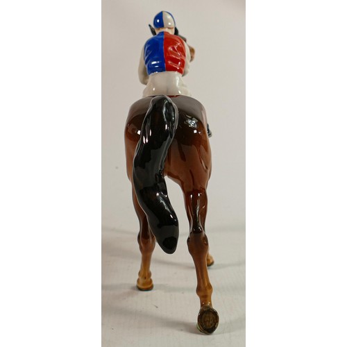 192 - Beswick Jockey on Walking Horse 1037, jockey in white, red & blue colourway, No7 detail noted on lig... 