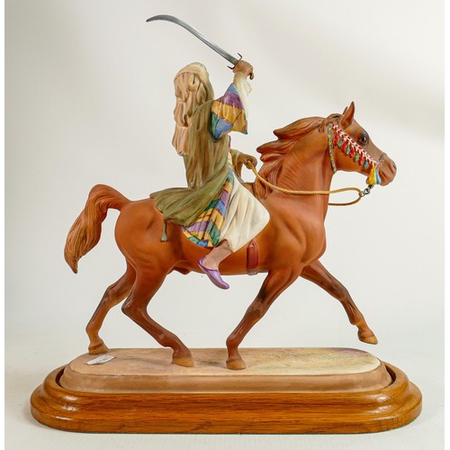 205 - Beswick rare Bedouin Arab on galloping horse 2275 on wood plinth.