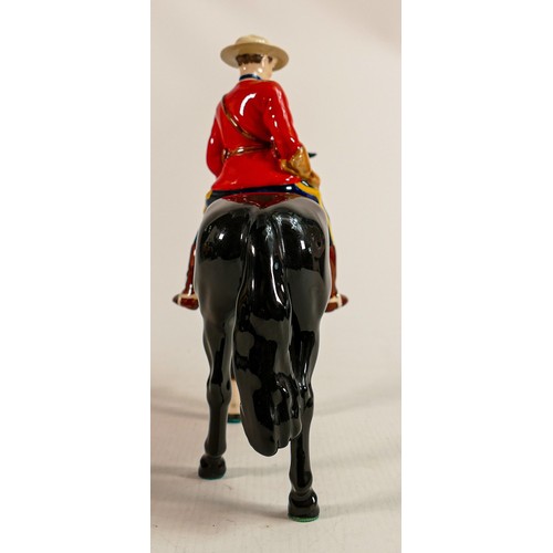 217 - Beswick Canadian Mountie policeman on black horse, restored ears.