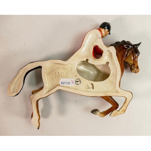 218 - Beswick wall plaque as huntsman on jumping horse 1505.