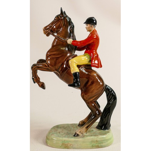 223 - Beswick Huntsman on rearing horse 868, early version with yellow trousers, restored.