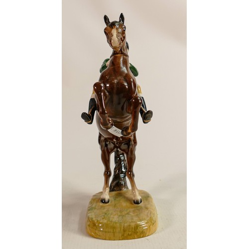 224 - Beswick Huntsman on rearing horse 868 with green jacket, restored foot on rider.