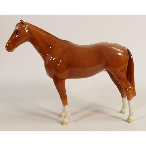 261 - Beswick chestnut Imperial horse 1557. a/f. Ends of Both ears chipped and some loss.