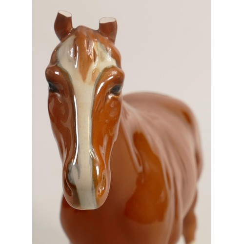 261 - Beswick chestnut Imperial horse 1557. a/f. Ends of Both ears chipped and some loss.